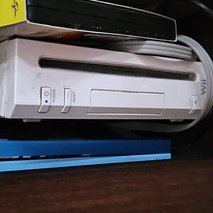 WII game counsel with games and accessories